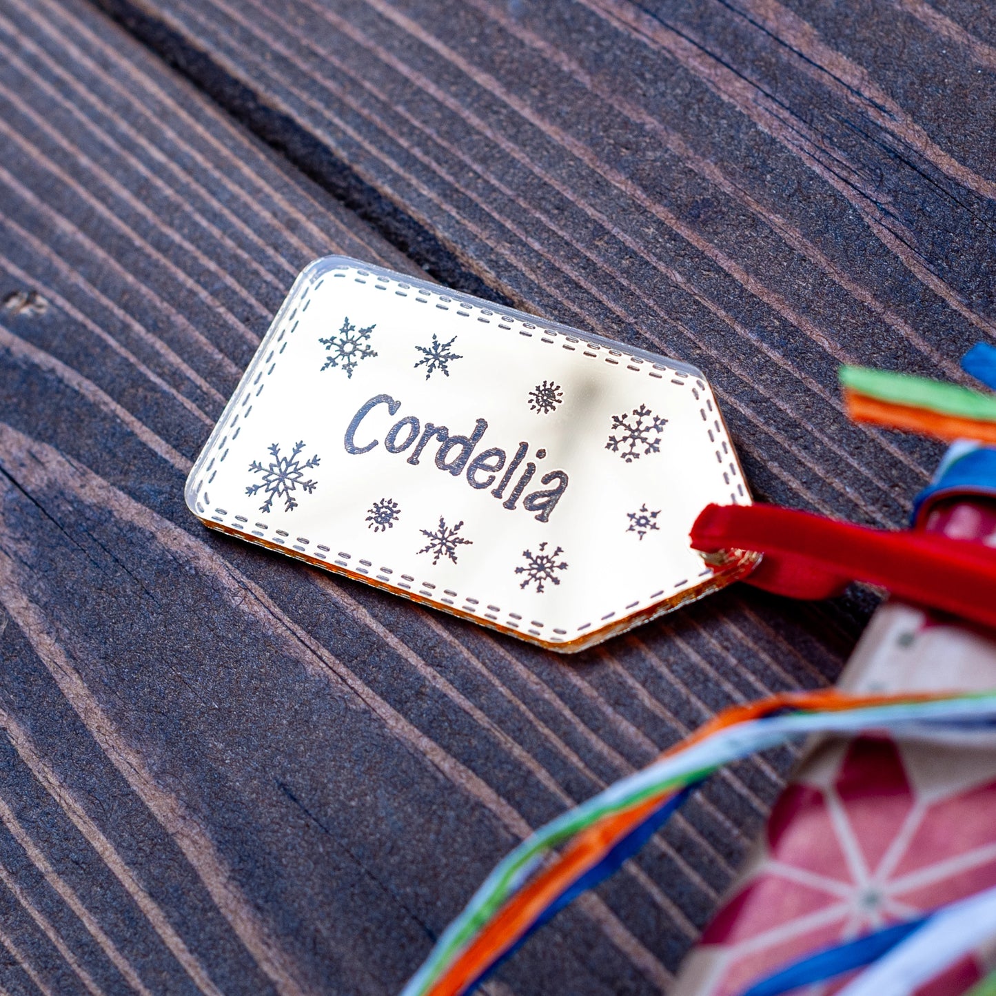 Personalised Christmas gift tag with engraved snowflake design