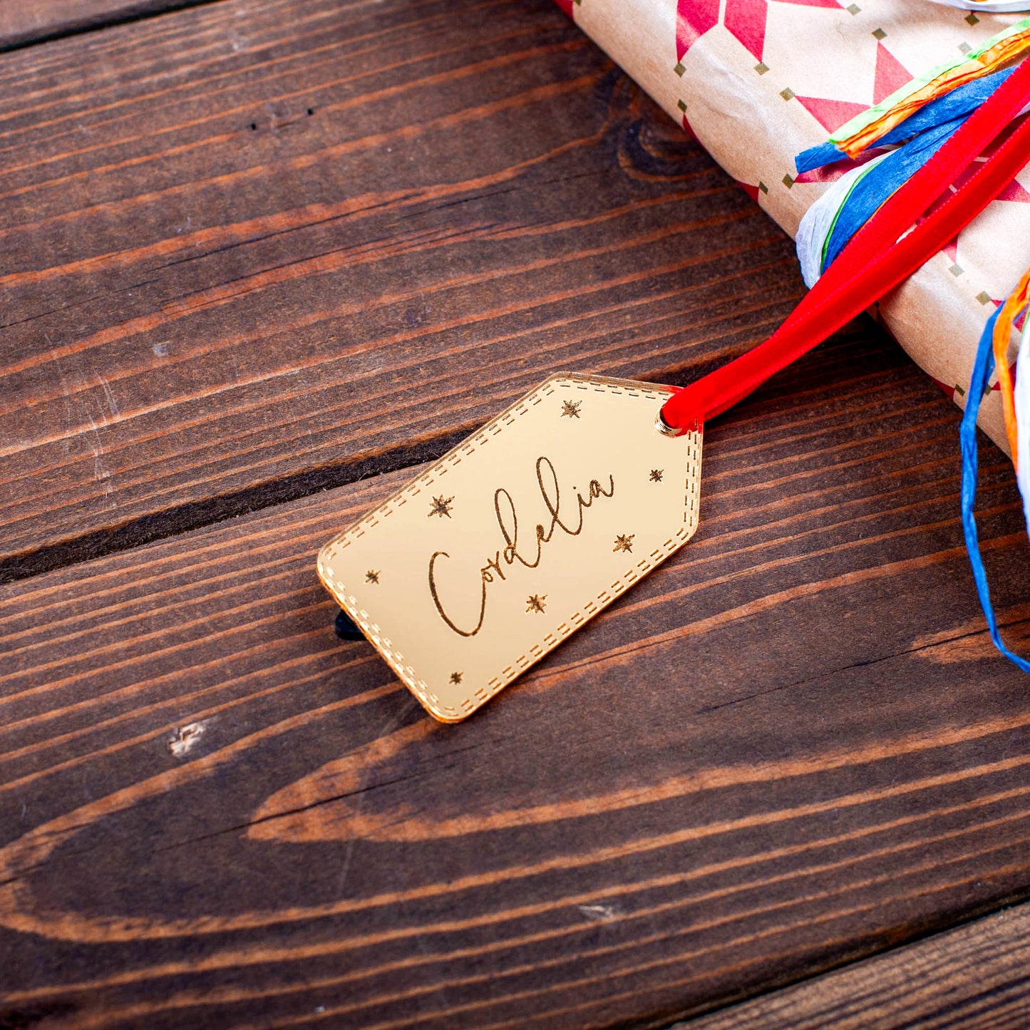 Personalised gold mirror acrylic label with engraved stars