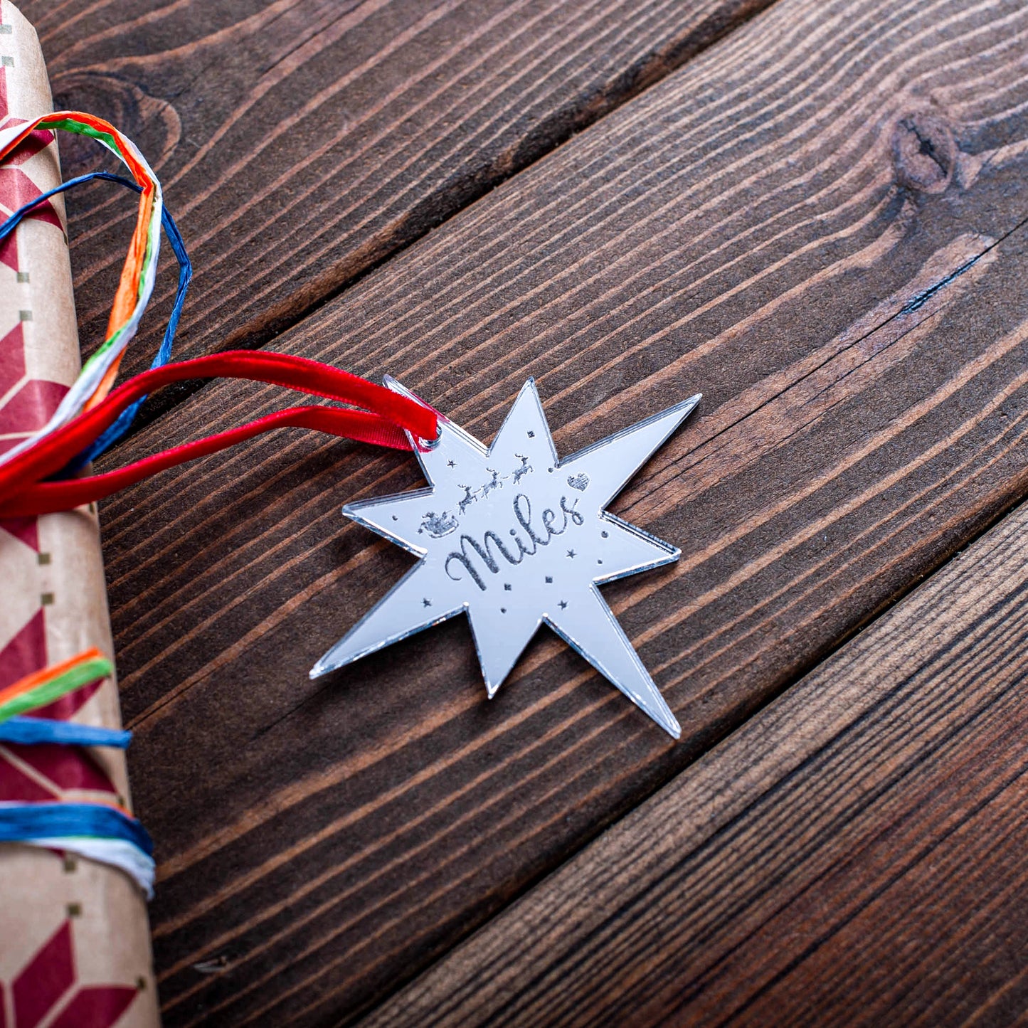 Personalised silver mirror star Christmas tag with engraved text