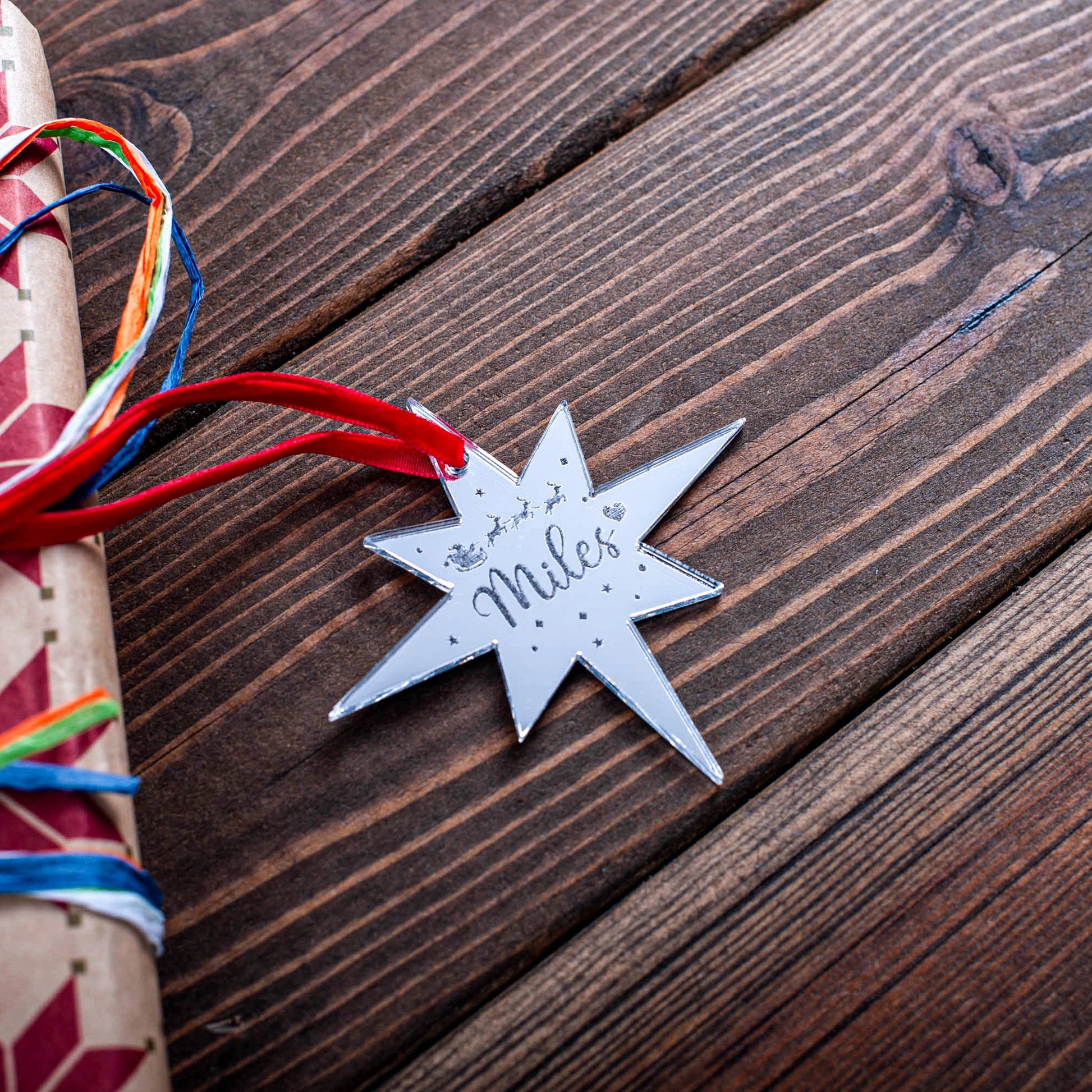 Personalised silver mirror star Christmas tag with engraved text