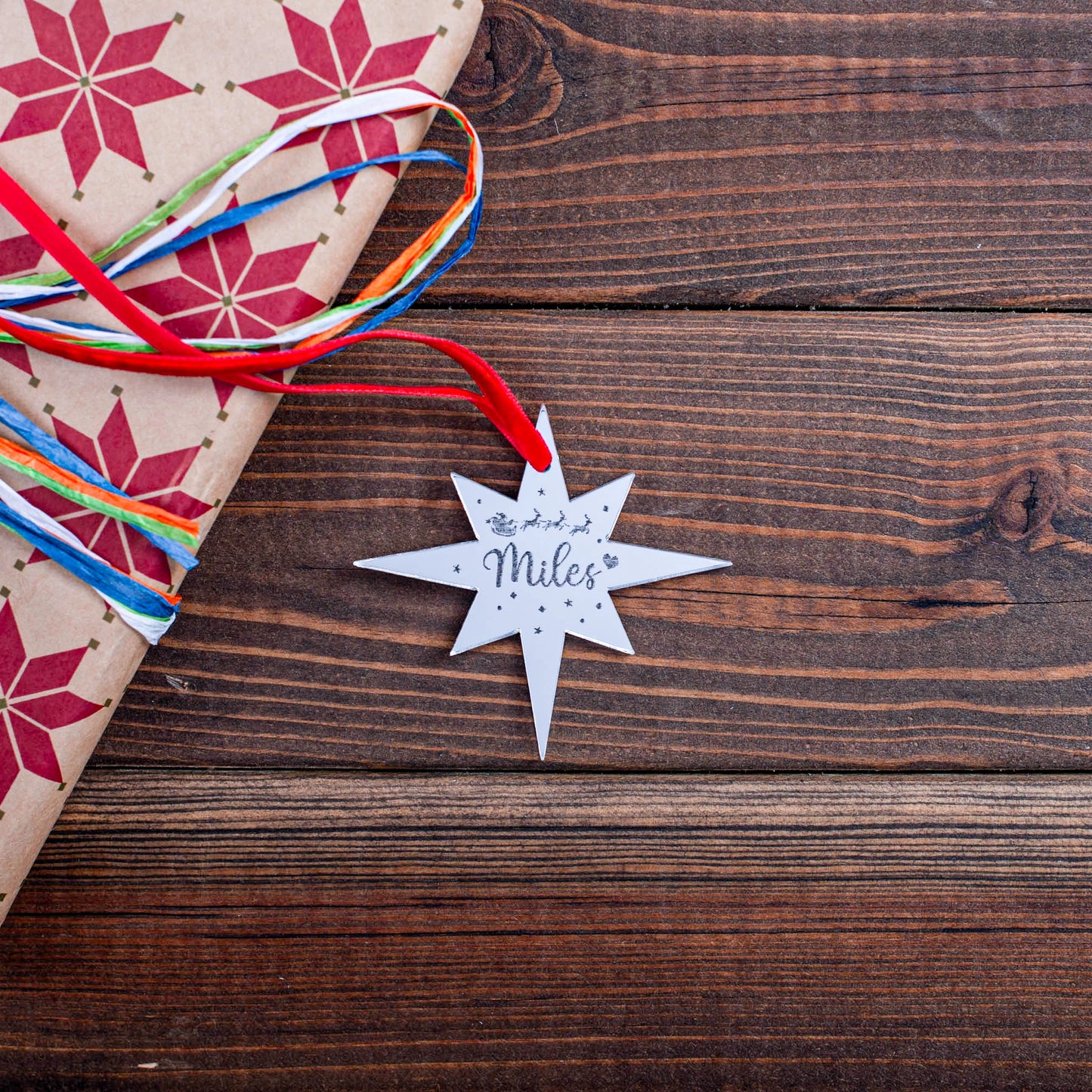 Luxury silver mirror star ornament for festive wrapping