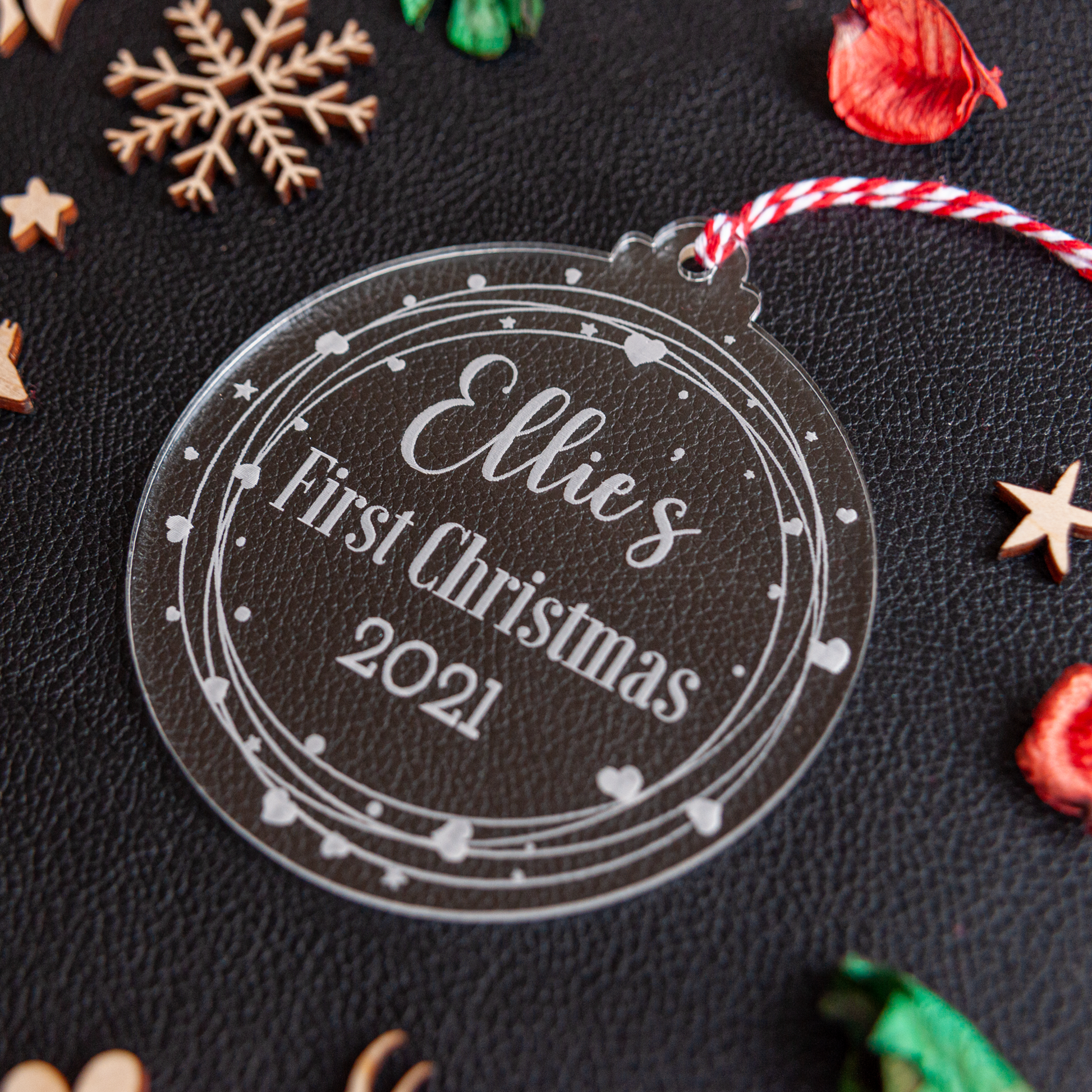 Clear acrylic first Christmas ornament personalised with baby’s name and year