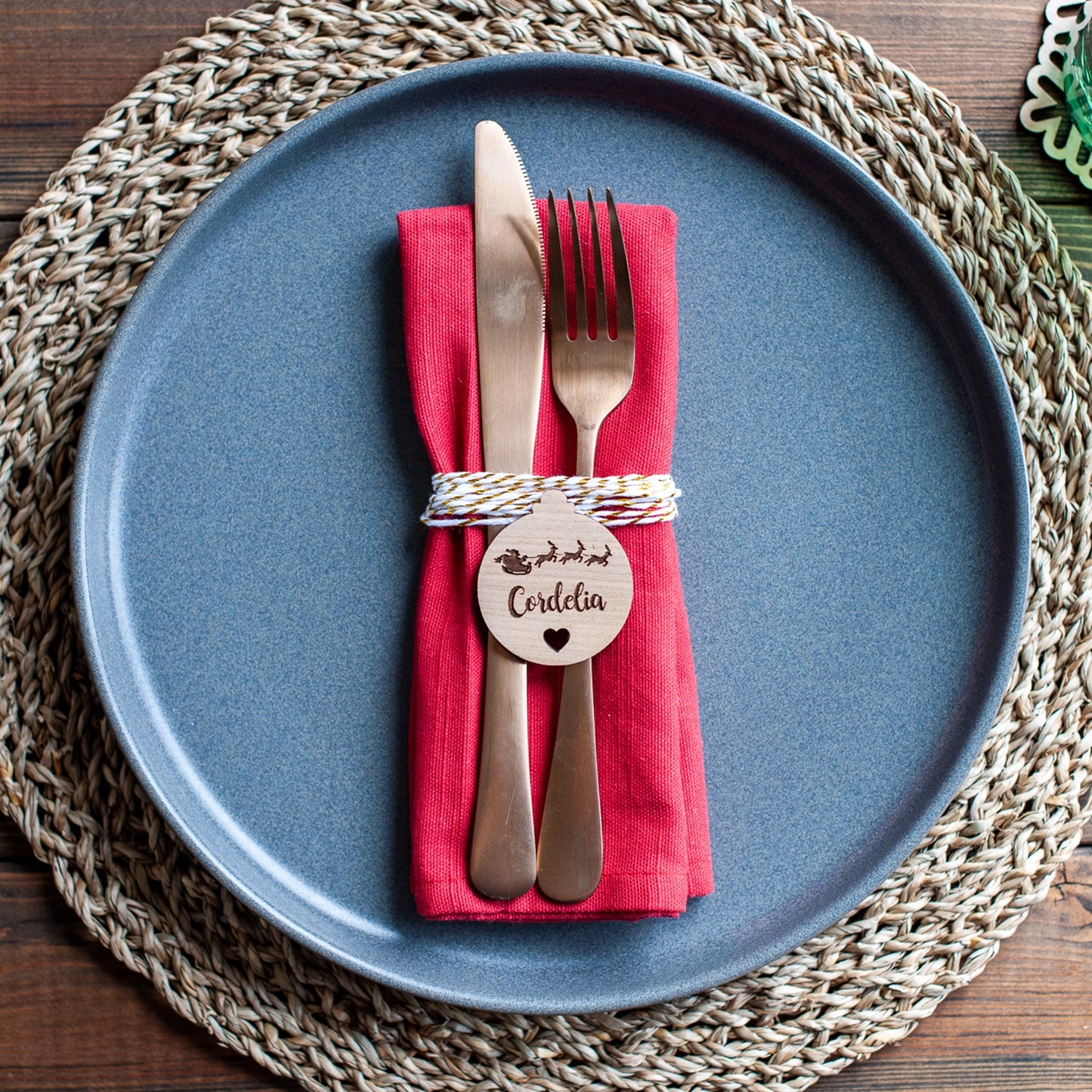 Personalised wooden table name tag with heart cutout and engraved Santa