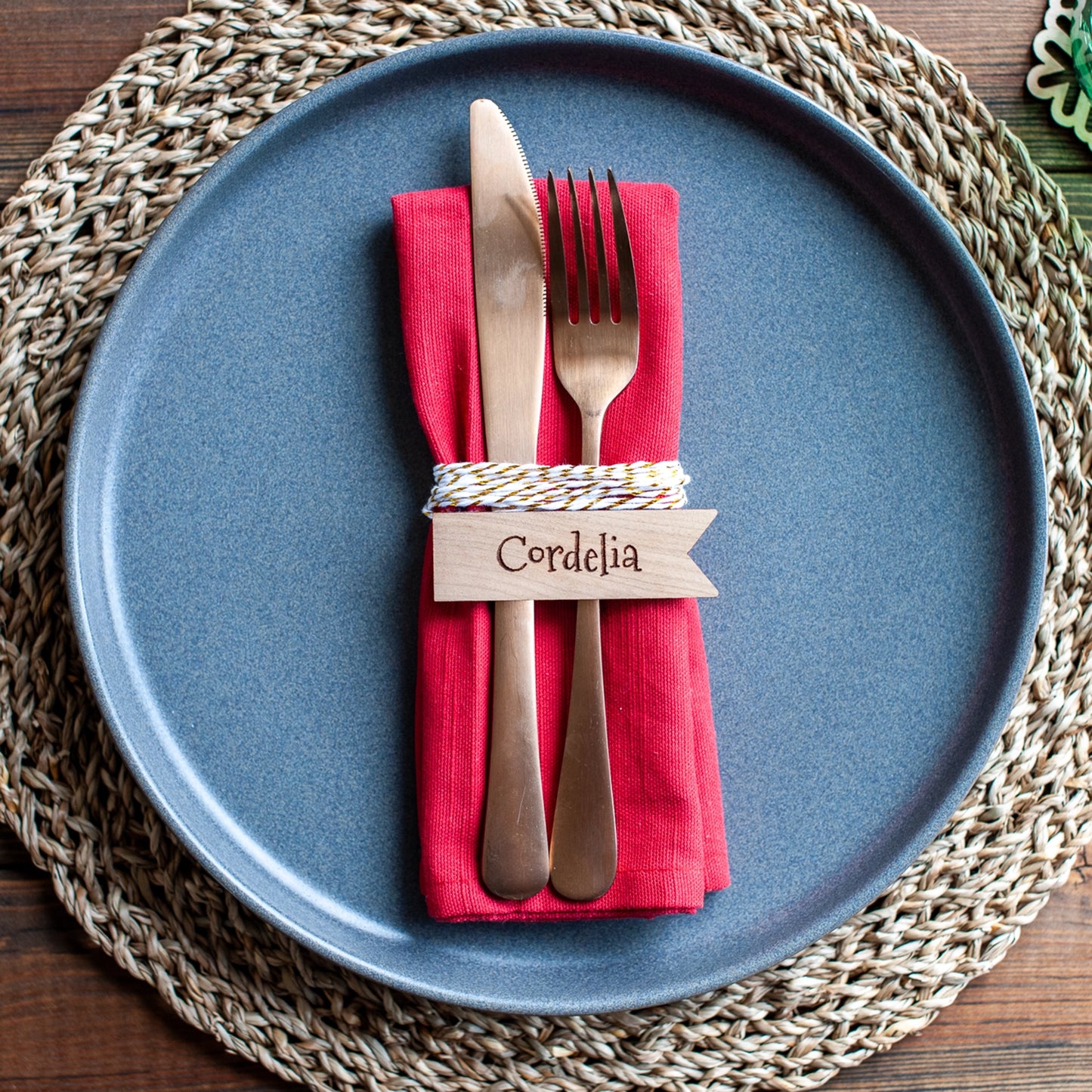 Personalised wooden place tag on festive dinner table