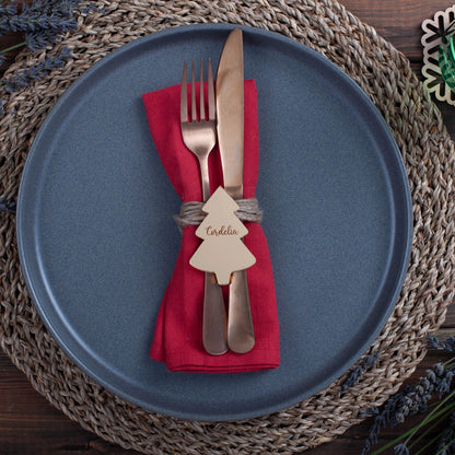 Laser-cut gold mirror place setting for winter wedding table