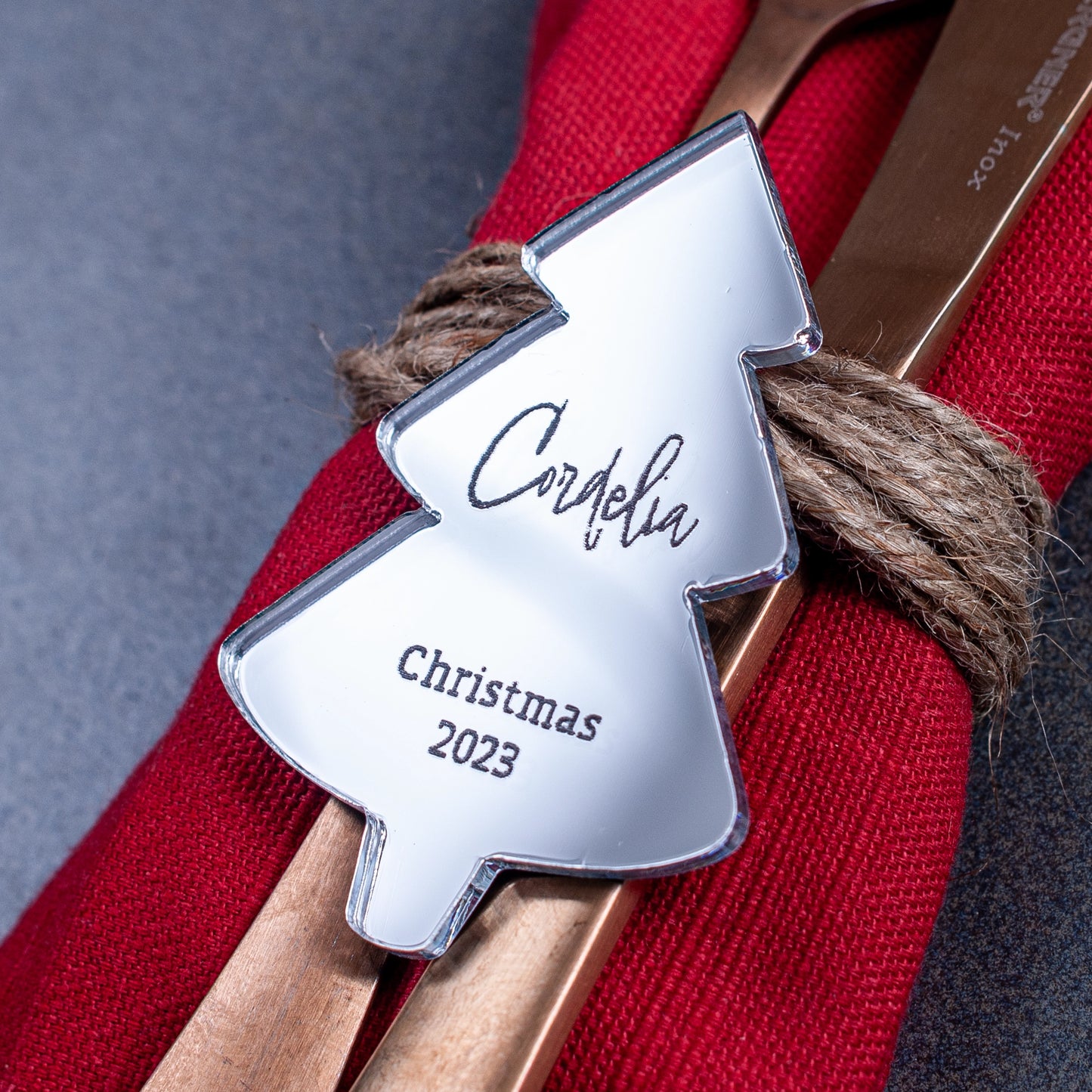 Silver mirror Christmas tree place setting with laser-cut name
