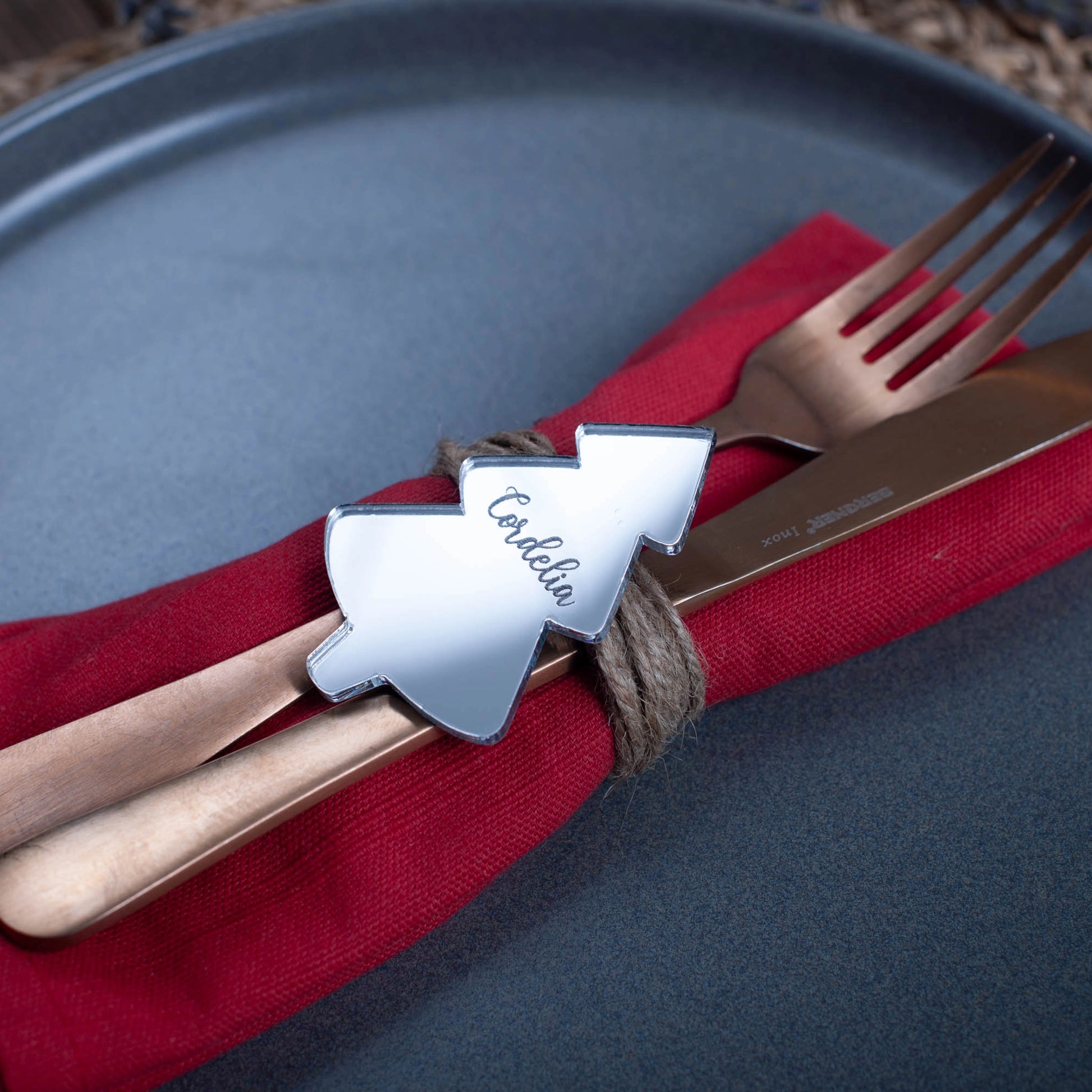 Reflective silver mirror place card shaped like a Christmas tree