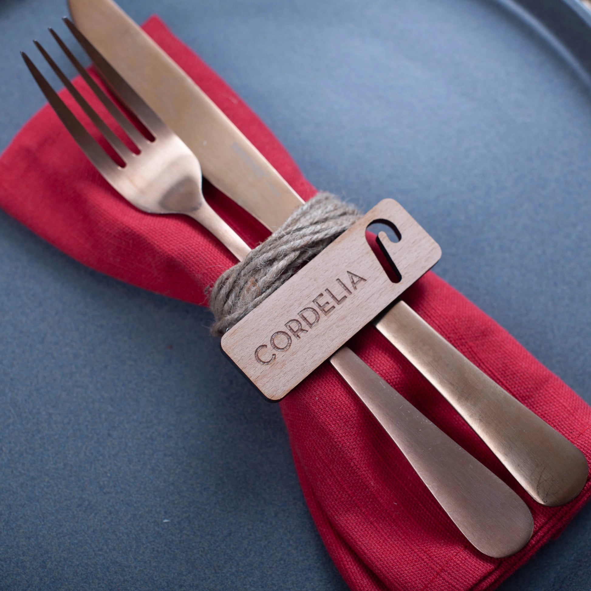 Engraved wooden Christmas label for rustic table décor with candy cane