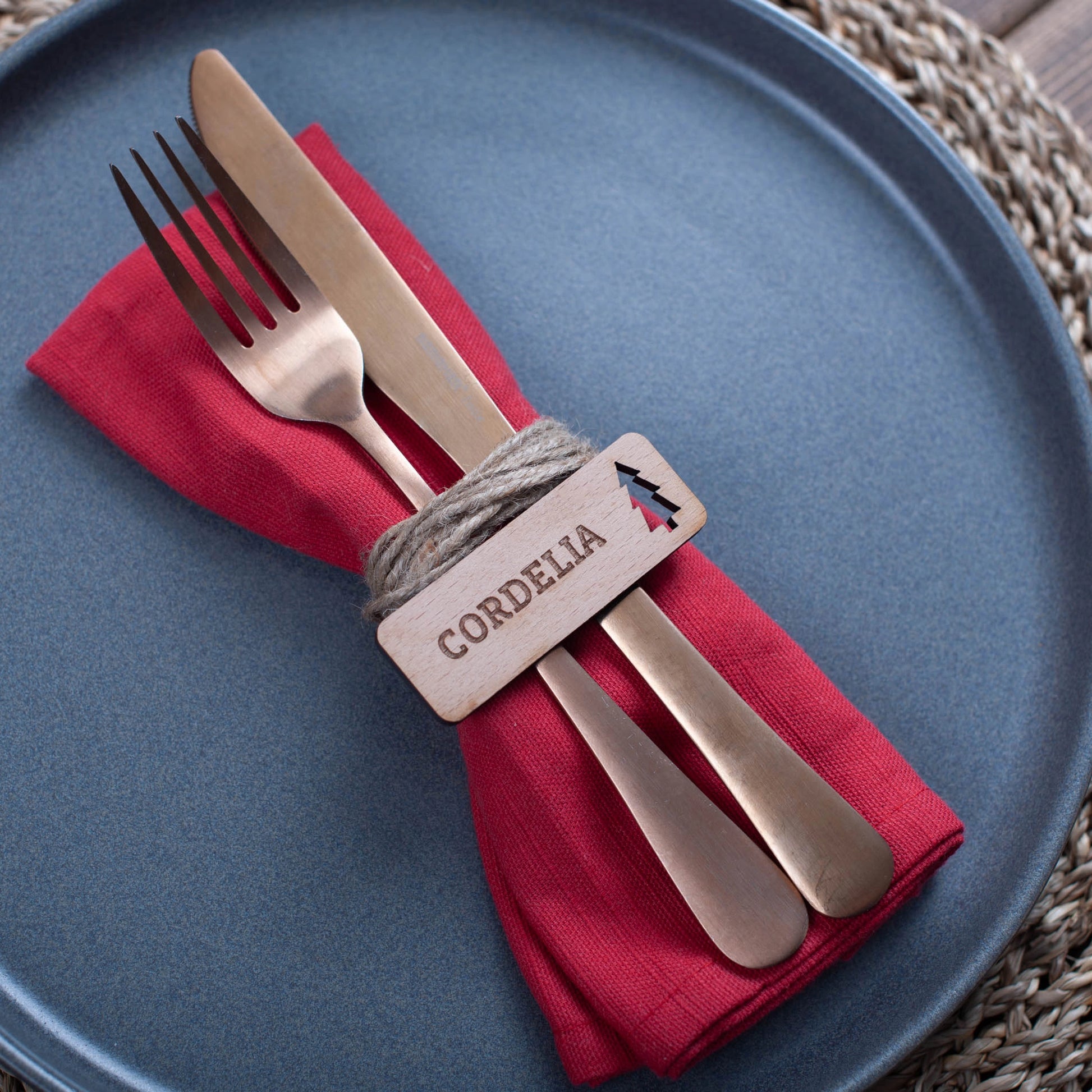 Engraved wooden rectangle Christmas tags displayed flat with christmas tree cutout