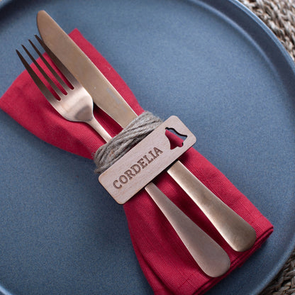 Handmade wooden Christmas place name label with bell cutout