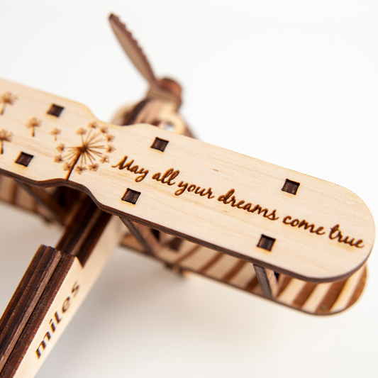 Wooden airplane puzzle with intricate laser-cut details