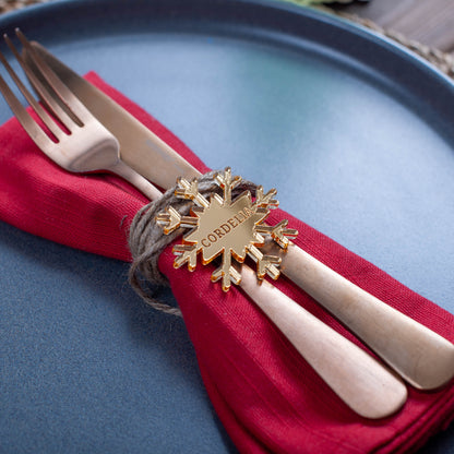 Laser-cut acrylic snowflake place card with engraved name