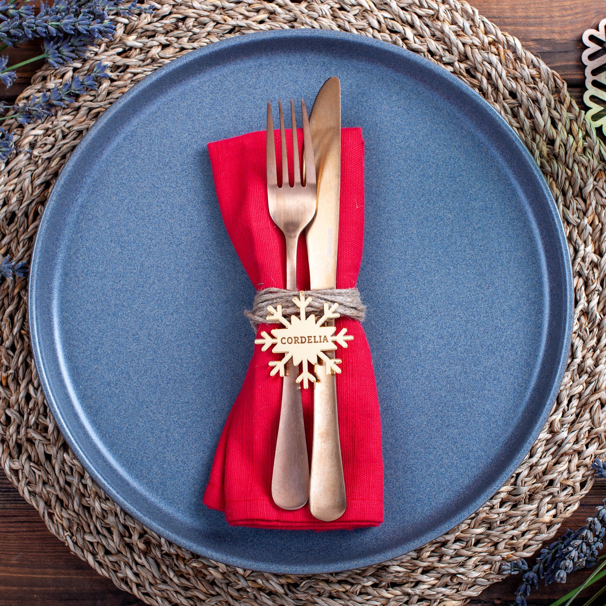Precision engraving detail on modern snowflake place setting