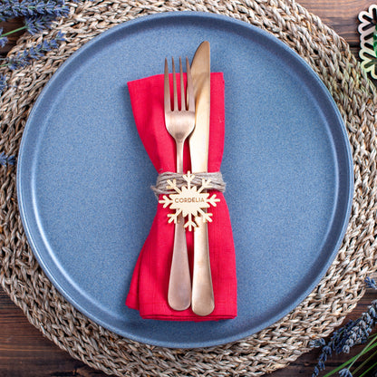 Modern dining table styled with engraved snowflake name tags