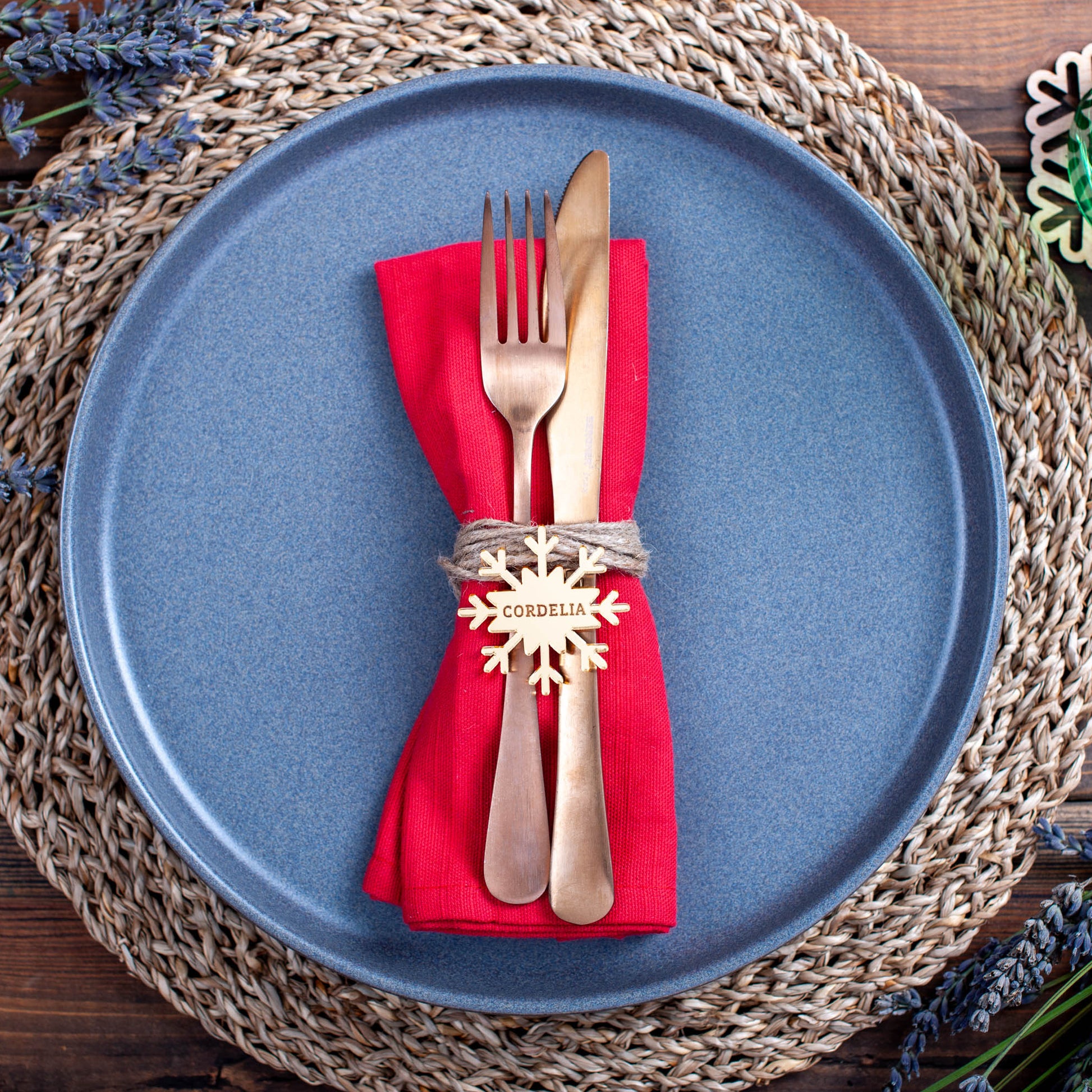 Minimalist Christmas tablescape featuring personalised snowflake place settings