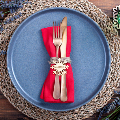 Minimalist Christmas tablescape featuring personalised snowflake place settings