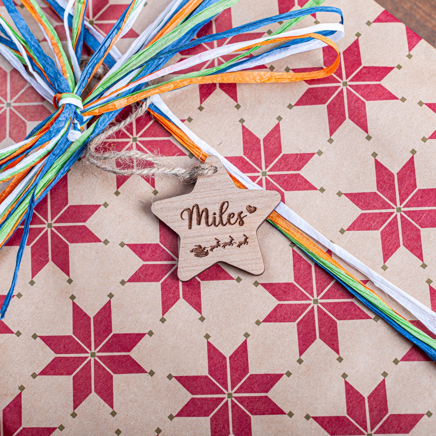 Laser cut star Christmas tag made from natural wood for gifting