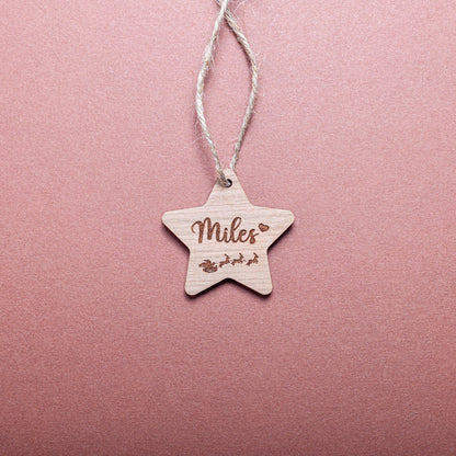 Custom wooden star ornament used as Christmas gift label