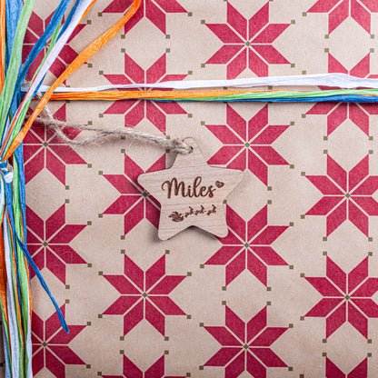 Rustic star-shaped wooden Christmas tag engraved for sustainable wrapping
