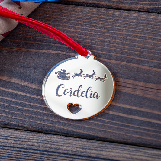 Wooden personalised Christmas bauble tag with heart and Santa engraving