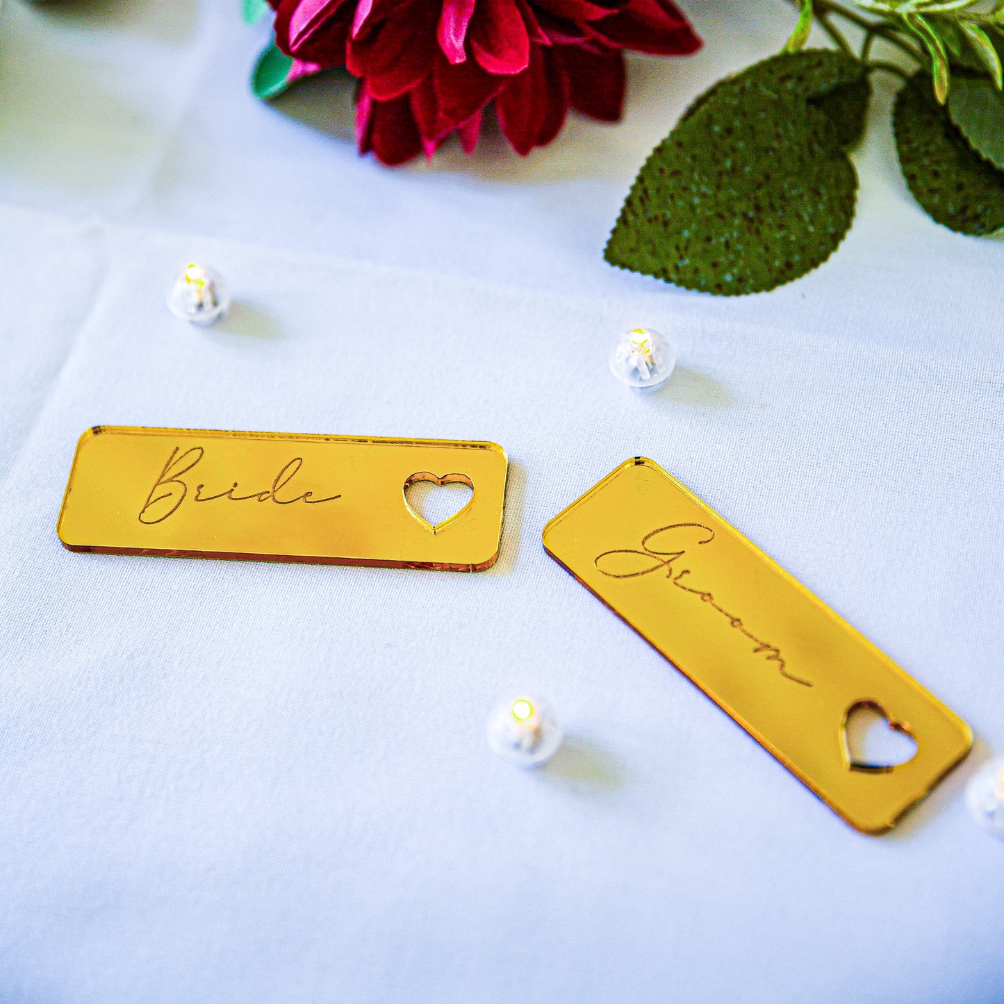 Mirror acrylic wedding name tags used as elegant table place cards