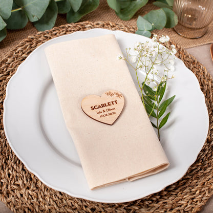 Personalised wooden heart place card engraved with guest name for wedding table setting