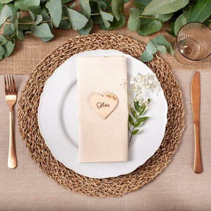 Wooden heart place name tag with floral cut design for wedding table setting