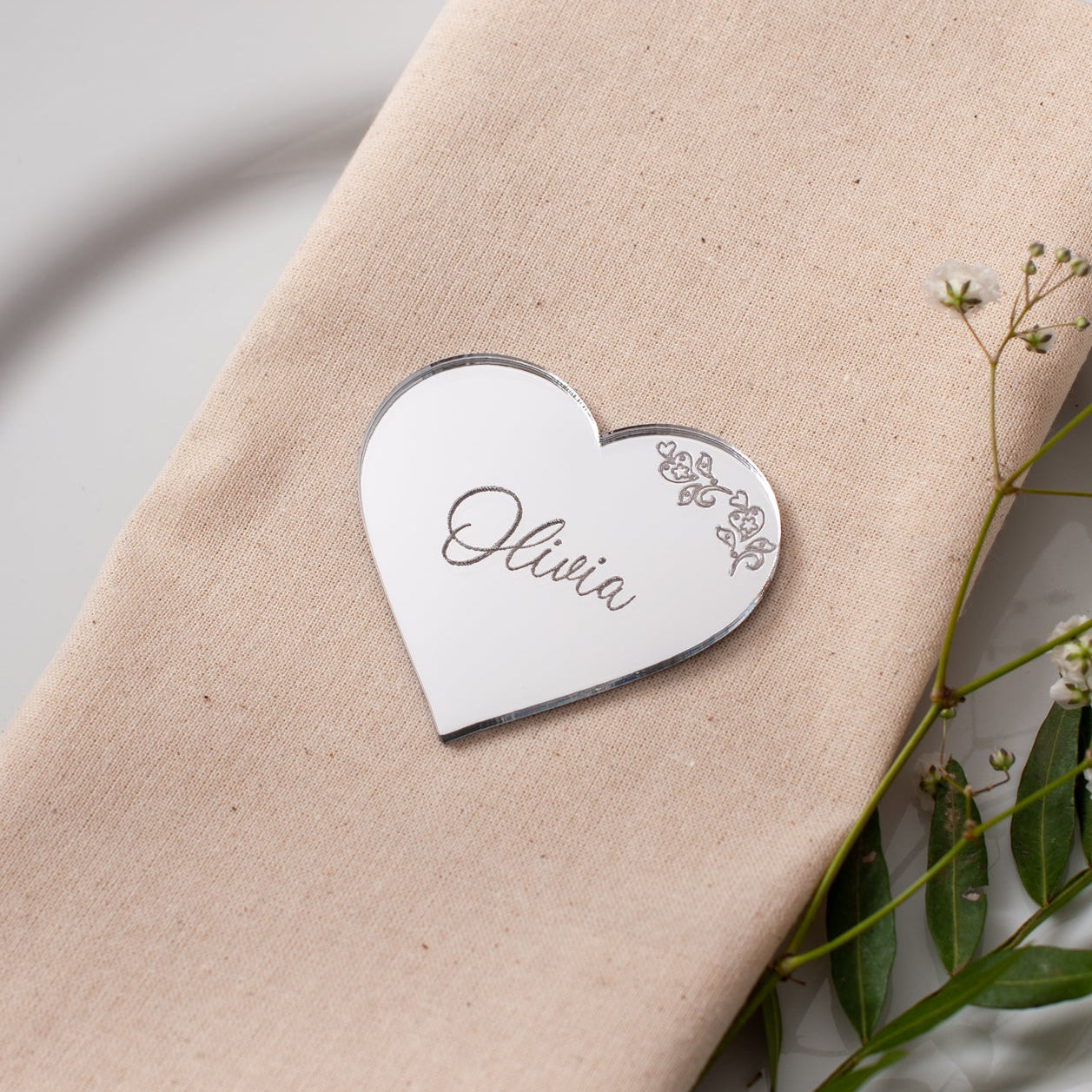 Personalised acrylic heart place card engraved with guest name for wedding