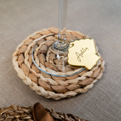 Personalised sea shell place card engraved with guest name for beach wedding