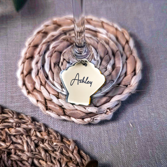 Coastal sea shell name tag for wedding table and drink setting