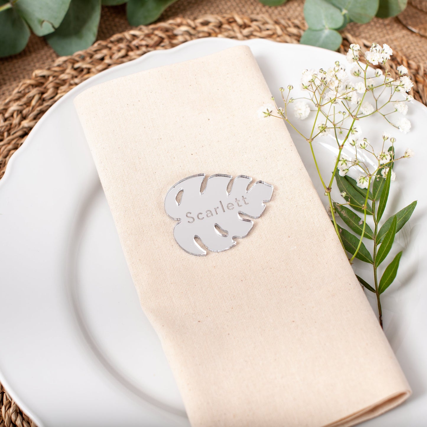 Personalised silver mirrored acrylic monstera leaf place card with engraved name