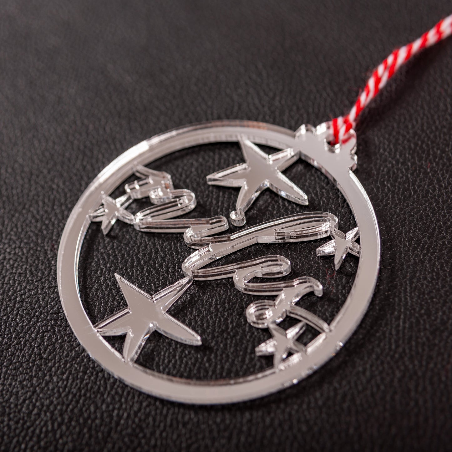 Custom name cutout bauble close-up showing fine details