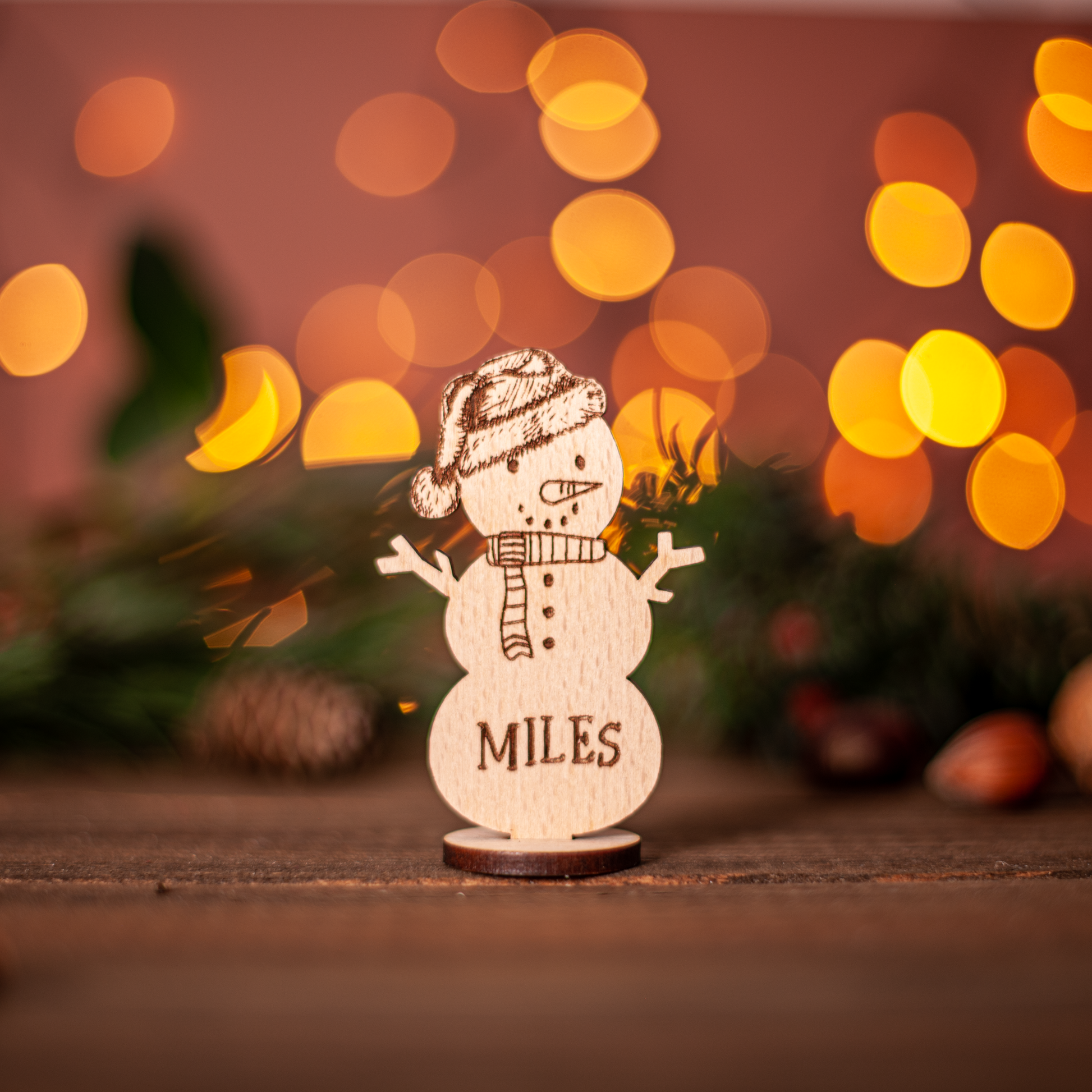 Laser cut snowman name tag in acrylic for festive dinner table