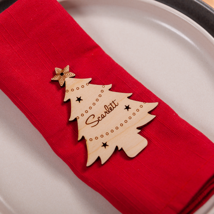Rustic personalised Christmas tree place name for winter wedding décor