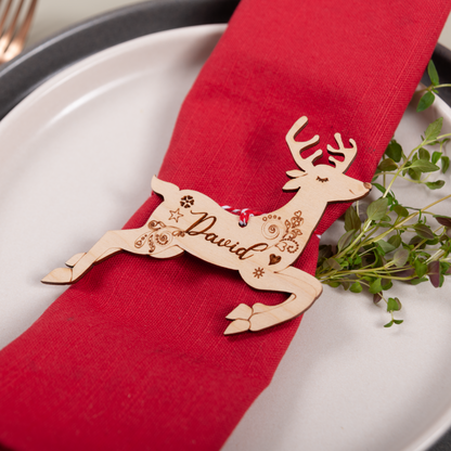 Wooden personalised reindeer name ornament used as table place setting